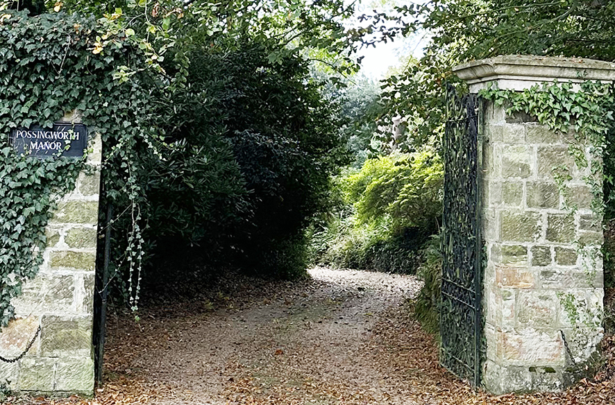 photograph of the front gate of Possingworth Manor